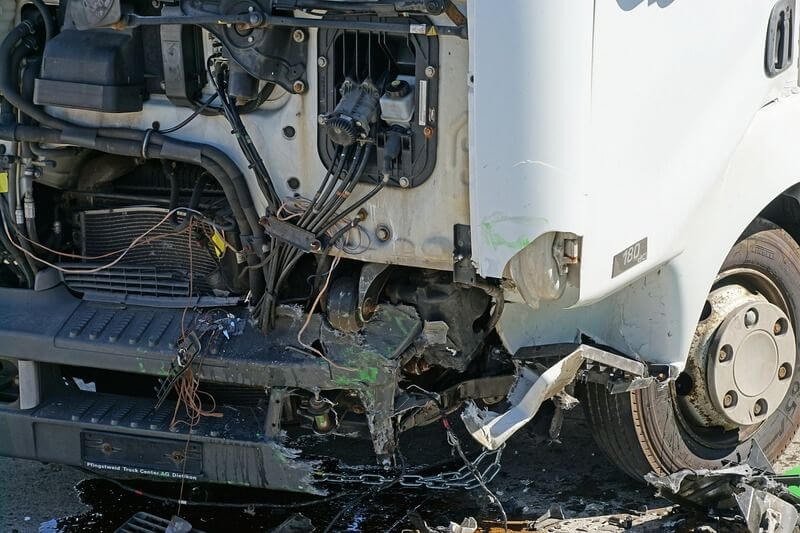 truck crashes into car