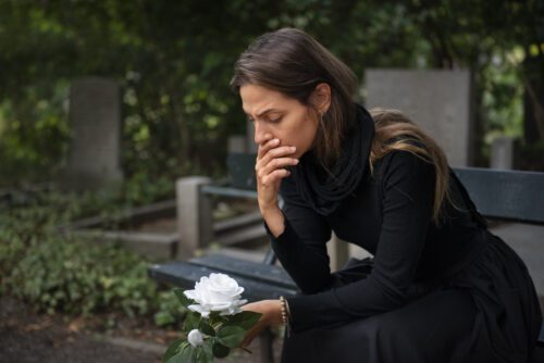 woman crying at funeral