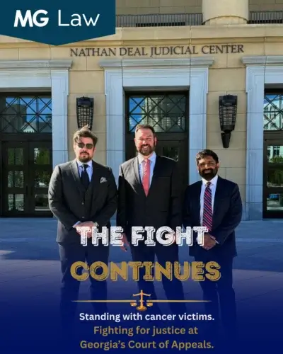 Three men in suits stand confidently outside the Nathan Deal Judicial Center. Text reads, "The Fight Continues. Standing with cancer victims. Fighting for justice at Georgia’s Court of Appeals."