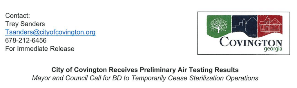 Alt text: "City of Covington press release header with contact info for Trey Sanders. Logo with tree, skyline, and house icons. Headline about air testing results."